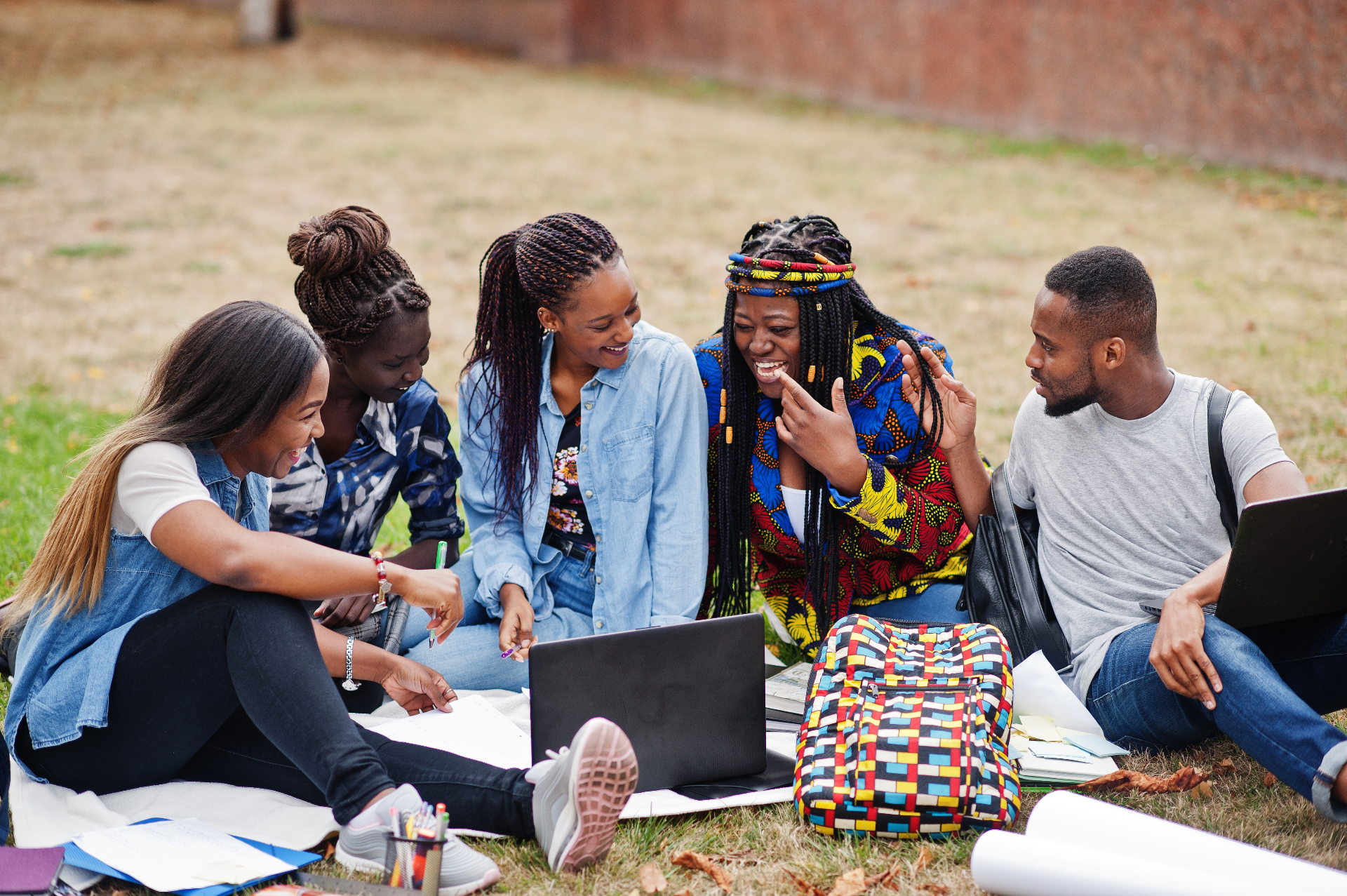 TUBHA students studying together outdoors